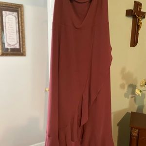 A cranberry color hi-low dress in like new condition